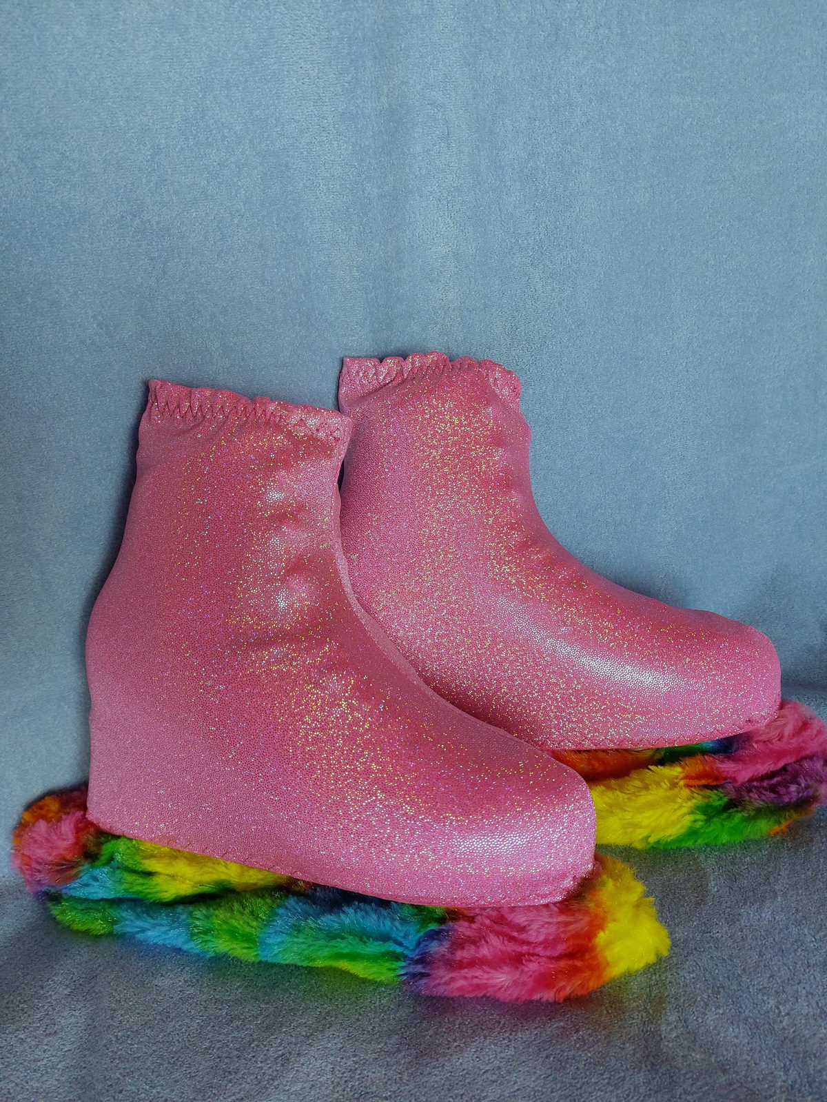 Black skating boot covers with rainbow fluffy finish